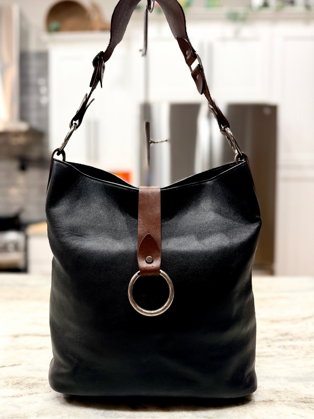 SAINT LAURENT Authentic Calfskin Ring Tote in Black and Brown.